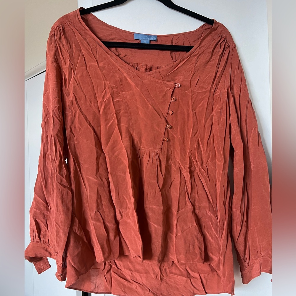 Rust orange blouse. Size M.